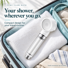 Pure Flow Bath white travel filter showerhead — travel view